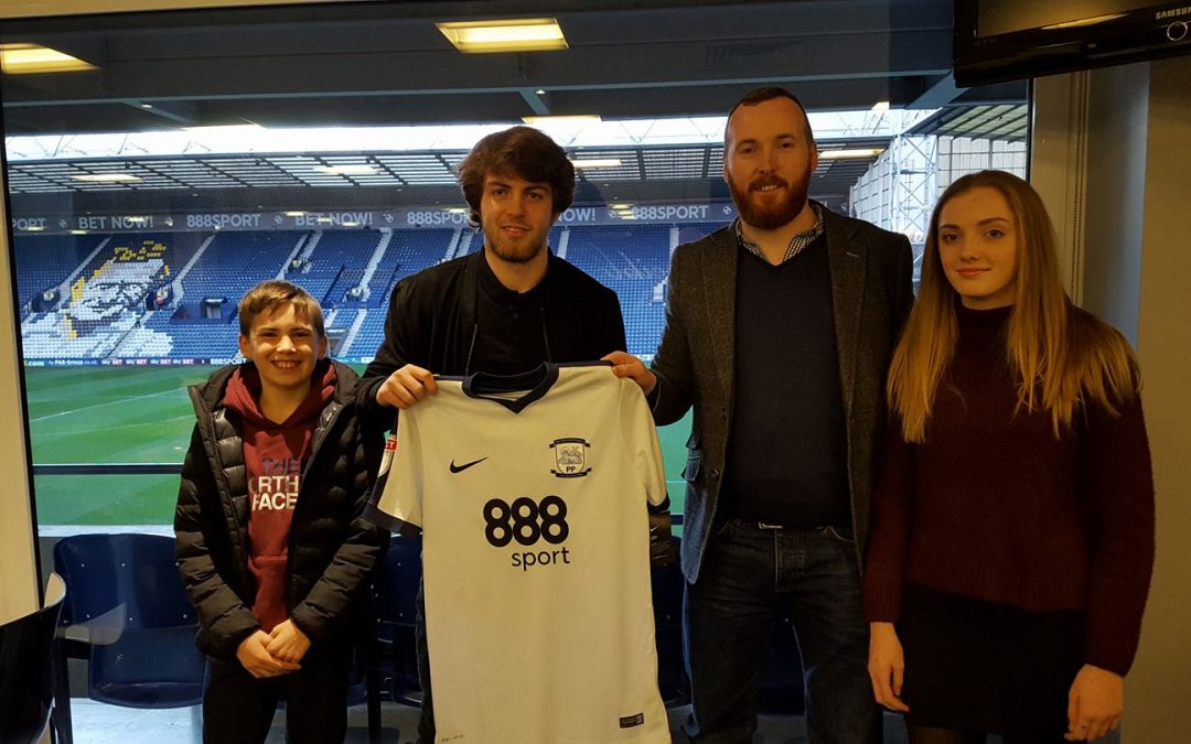 Ben Pearson presents his shirt to Mark Murphy, Managing Director of sponsor i4C Process Ltd